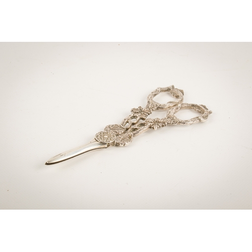 53 - A pair of Victorian silver grape scissors. The handles modelled as vines, hallmarked to one blade Hi... 