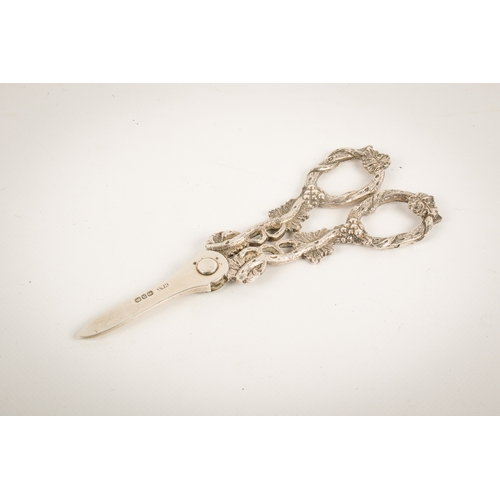 53 - A pair of Victorian silver grape scissors. The handles modelled as vines, hallmarked to one blade Hi... 