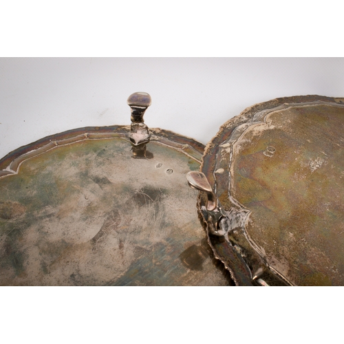 61 - A pair of 19th century Irish silver round trays. With shaped rims, central engraved crown over gryph... 