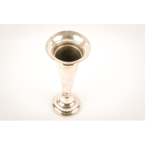 35 - A large early 20th century weighted silver tulip vase. With outturned rim, over a tapered body and s... 