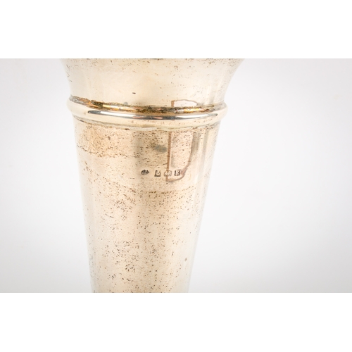 35 - A large early 20th century weighted silver tulip vase. With outturned rim, over a tapered body and s... 