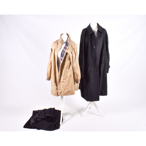 126 - Three ladies' coats. Comprising a Julia black wool and cashmere blend coat with a velvet collar, siz... 