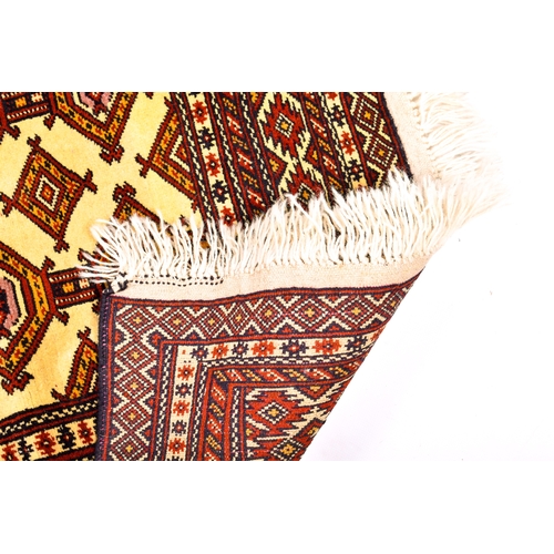 144 - A modern geometric red and blue rug Persian style rug. Having multiple geometric borders and traditi... 