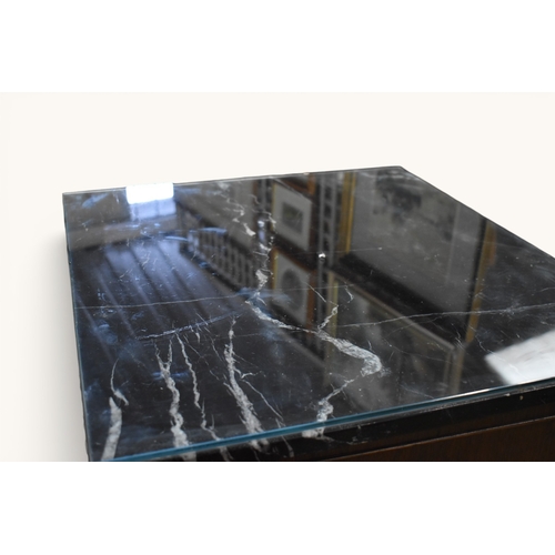 256 - A pair contemporary Regency style marble top cupboards retailed by John Tanous Ltd. Having checkerbo... 