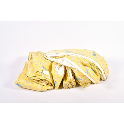 277 - Three pairs of lined and pleated, yellow curtains with birds in foliage pattern. Drop 175cm top widt... 
