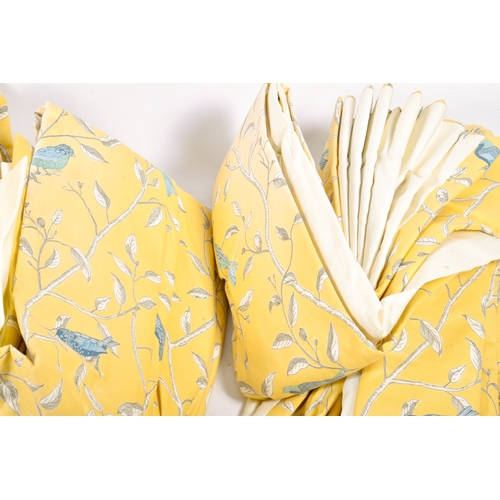 277 - Three pairs of lined and pleated, yellow curtains with birds in foliage pattern. Drop 175cm top widt... 