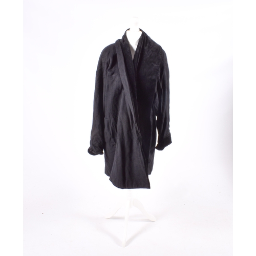 126 - Three ladies' coats. Comprising a Julia black wool and cashmere blend coat with a velvet collar, siz... 