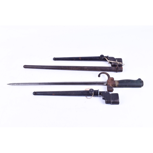 259 - Militaria - a French Lebel bayonet and two British No. 4 spike bayonets. Largest 48cm long, all with... 
