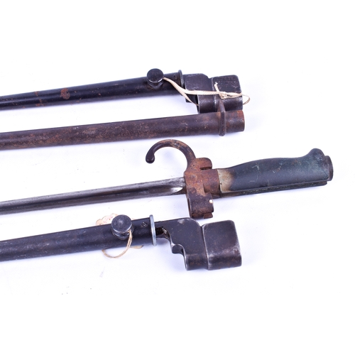 259 - Militaria - a French Lebel bayonet and two British No. 4 spike bayonets. Largest 48cm long, all with... 
