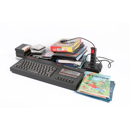 A Sinclair 128K ZX Spectrum + 2A home personal computer with games and ...