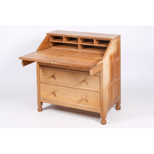 1 - Robert 'Mouseman' Thompson (British, 1876-1975) of Kilburn. A solid, light oak bureau with adzed top... 