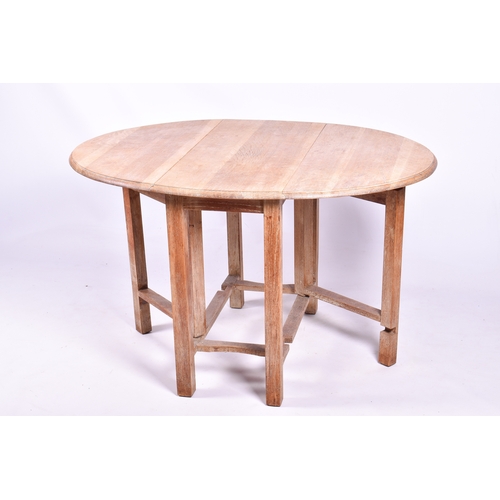 10 - A circa 1930s Arts and Crafts, limed oak table and four chairs by Rowley, in the manner of Heals. Th... 