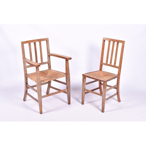 10 - A circa 1930s Arts and Crafts, limed oak table and four chairs by Rowley, in the manner of Heals. Th... 