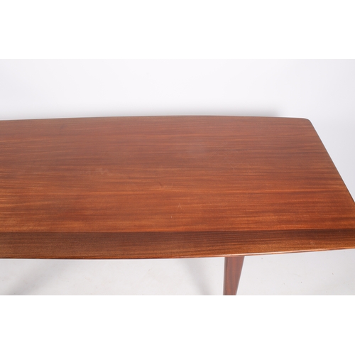 15 - John Herbert (British) for A. Younger mid-20th century, solid afromosia teak dining table and six ch... 