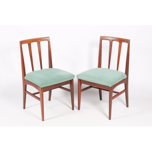 15 - John Herbert (British) for A. Younger mid-20th century, solid afromosia teak dining table and six ch... 