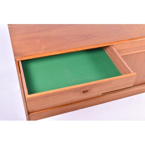 19 - A mid-20th century Danish made teak sideboard. Stamped Made in Denmark to the reverse. Three drawers... 