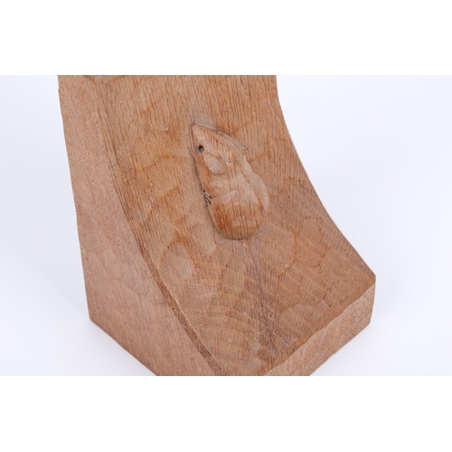 2 - Robert 'Mouseman' Thompson (British, 1876-1975) of Kilburn. A pair of oak bookends with hand tooled ... 