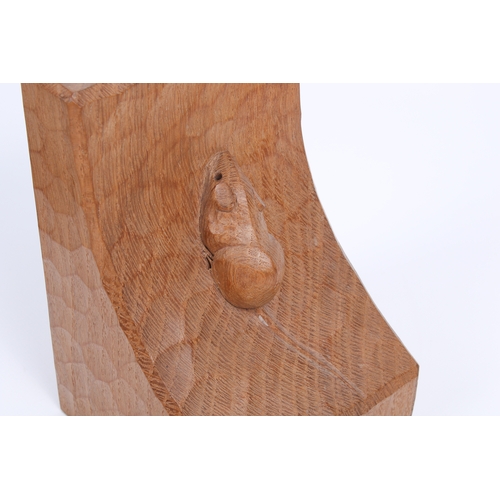 2 - Robert 'Mouseman' Thompson (British, 1876-1975) of Kilburn. A pair of oak bookends with hand tooled ... 