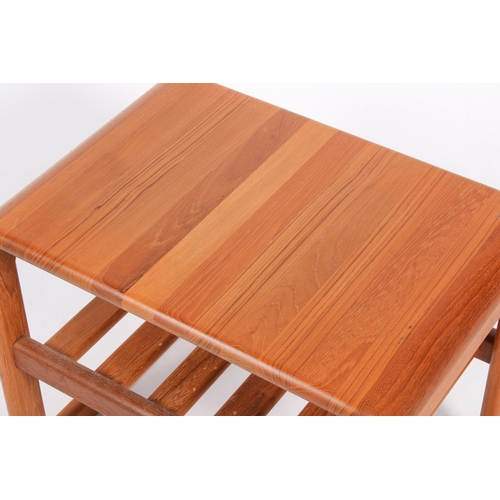 33 - A Danish, mid-century solid teak side table by Drylund. Curved edge top above slatted magazine shelf... 