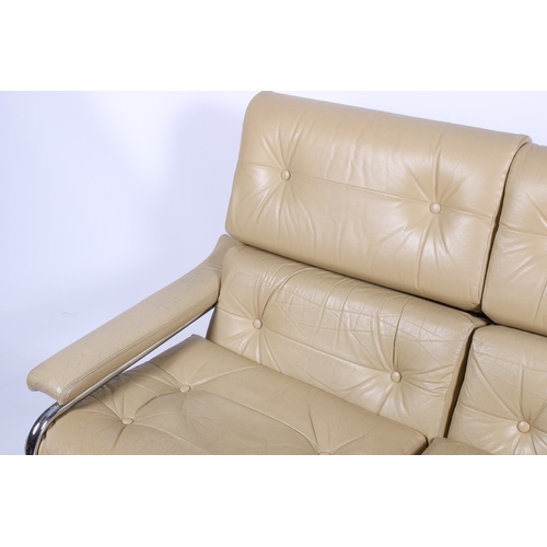 36 - A 20th century Pieff 'Alpha' two-seater leather cream sofa. Removable cushions are in original (labe... 