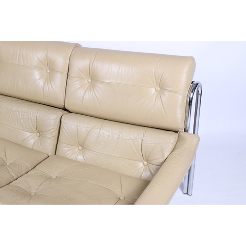 36 - A 20th century Pieff 'Alpha' two-seater leather cream sofa. Removable cushions are in original (labe... 