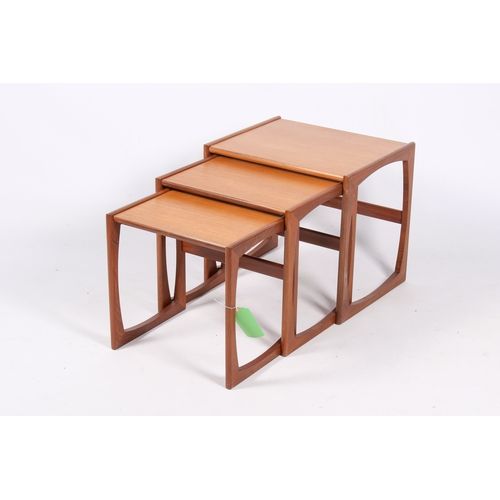 44 - A mid-20th century G-Plan ' Quadrille' nest of three tables. Constructed from teak, supports united ... 