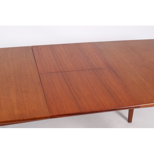 46 - A Danish style, mid-century teak extending dining table and five chairs. Teak frame chairs with blac... 