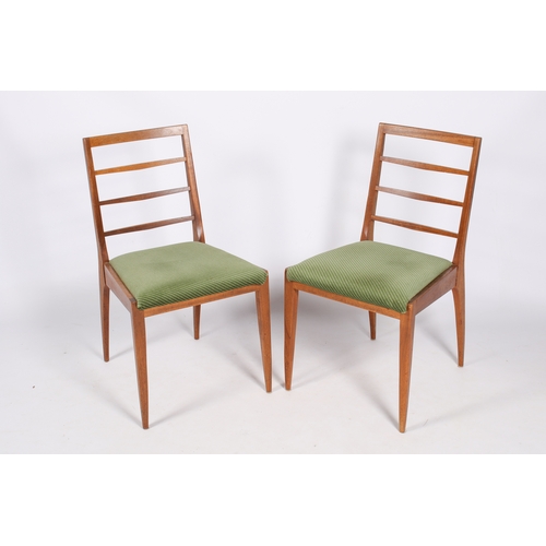 55 - A mid-century McIntosh teak dining table and six chairs from the Dunvegan range. Solid teak frame ch... 