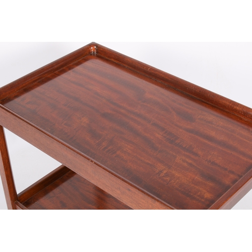 56 - A 20th century, Gordon Russell two-tier mahogany trolley on wheels. Stamped to the underside for Rus... 