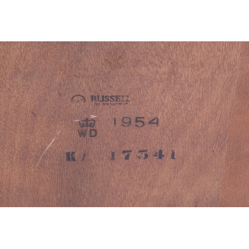 56 - A 20th century, Gordon Russell two-tier mahogany trolley on wheels. Stamped to the underside for Rus... 