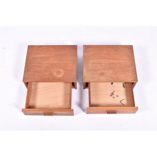 58 - A mid-20th century pair of bedside tables attavched to headboard (removable). Each unit with a singl... 