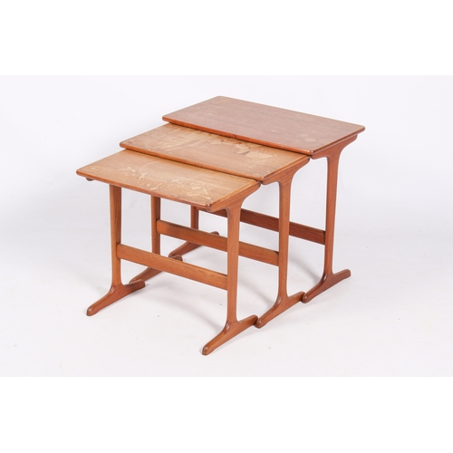 60 - A mid-century, Danish style teak nest of table. Three graduating tables connected via runners. Marks... 