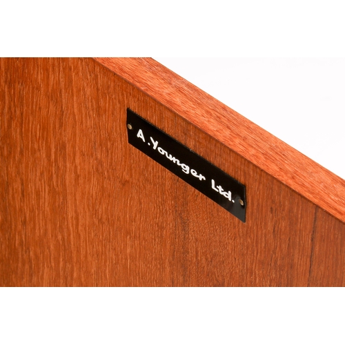 14 - John Herbert (British) for A. Younger mid-20th century, solid afromosia teak sideboard. Curved, lip ... 