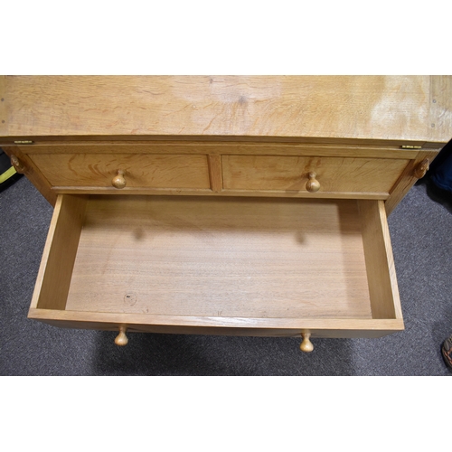 1 - Robert 'Mouseman' Thompson (British, 1876-1975) of Kilburn. A solid, light oak bureau with adzed top... 