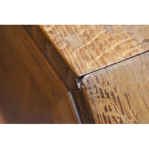 1 - Robert 'Mouseman' Thompson (British, 1876-1975) of Kilburn. A solid, light oak bureau with adzed top... 