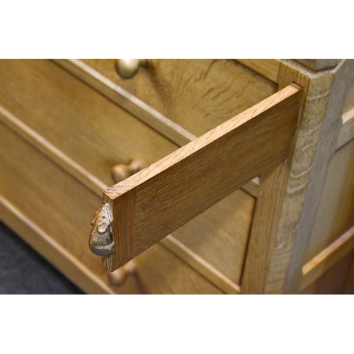 1 - Robert 'Mouseman' Thompson (British, 1876-1975) of Kilburn. A solid, light oak bureau with adzed top... 