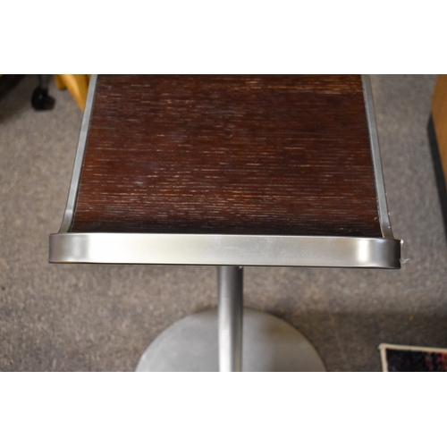 50 - A pair of Italian, Lapalma 'Lem S80' retro style adjustable stools. Dark stained bentwood seats on c... 