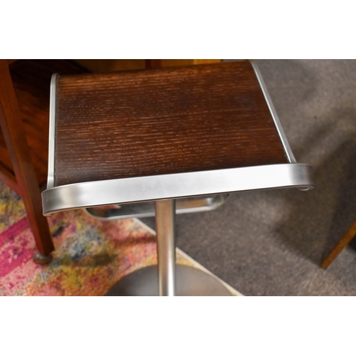 50 - A pair of Italian, Lapalma 'Lem S80' retro style adjustable stools. Dark stained bentwood seats on c... 