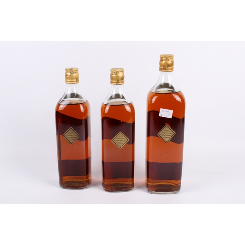 207 - Three vintage 12 years old bottles of Johnnie Walker Black Label whisky. Two 750ml and one 1 litre.