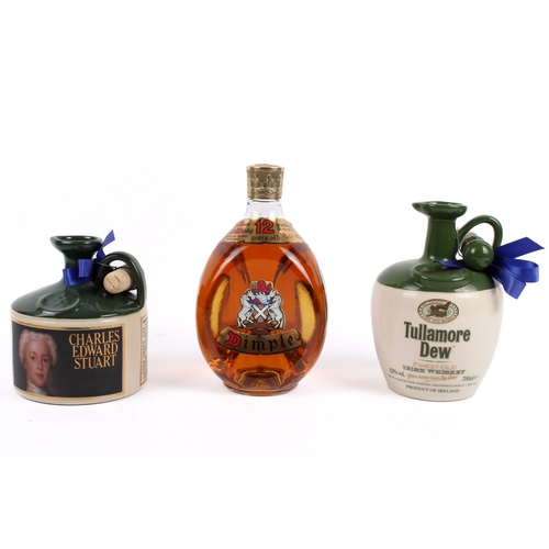 213 - A group of three assorted bottles of whiskey. Including  Tullamore Dew 700ml, Dimple De Luxe 750ml a... 