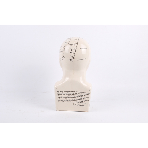 218 - A reproduction 'Phrenology by L. N. Fowler' ceramic head. H28cm