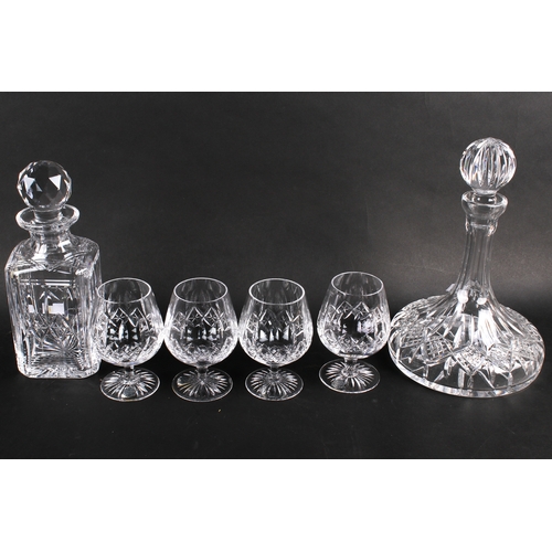 228 - Four Stuart lead crystal brandy glasses and two decanters. Largest H30cm