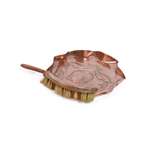 231 - A vintage Newlyn style hand decorated copper dust pan and brush set, unmarked. Having a scallope she... 