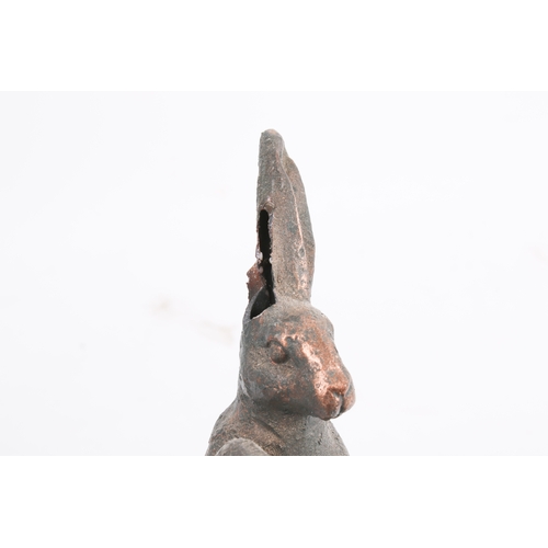 258 - A collection of assorted models of hares plus a cast metal cockerill doorstops. Largest H50cm