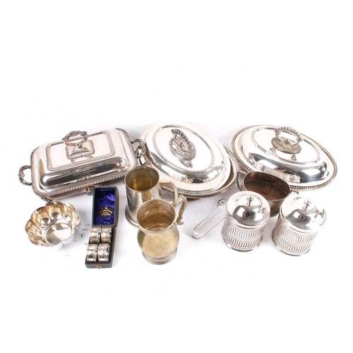 189 - A box of assorted silver plated table items. Including two oval entree dishes and a rectangular entr... 