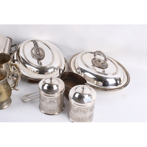 189 - A box of assorted silver plated table items. Including two oval entree dishes and a rectangular entr... 