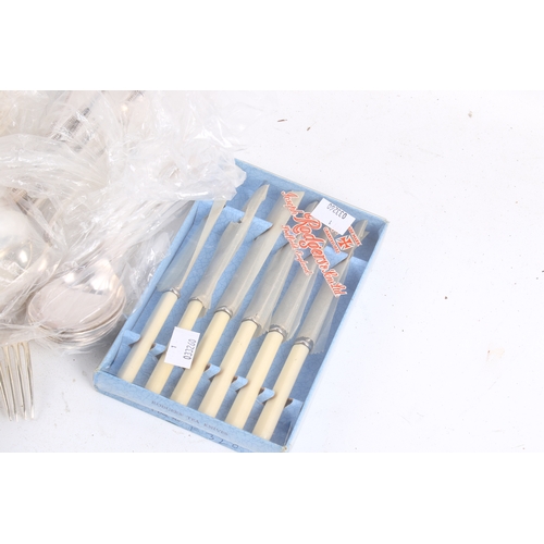 192 - A collection of assorted silver plate flatware. Including boxed knives and Waring & Gillow spoons an... 