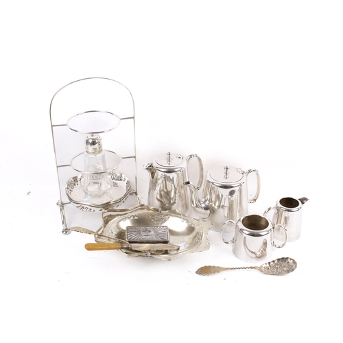 196 - A group of assorted silver plate. Including a cake stand, three piece tea set, etc. Largest H38cm