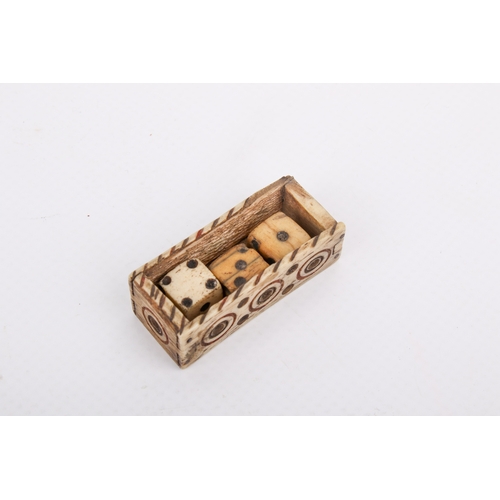 10 - A Napoleonic prisoner of war bone games box. With engraved and painted decoration and a sliding lid,... 