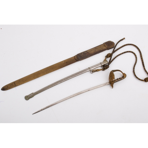 30 - A late 19th/early 20th century sword letter opener and an early 20th century brass letter opener. Th... 